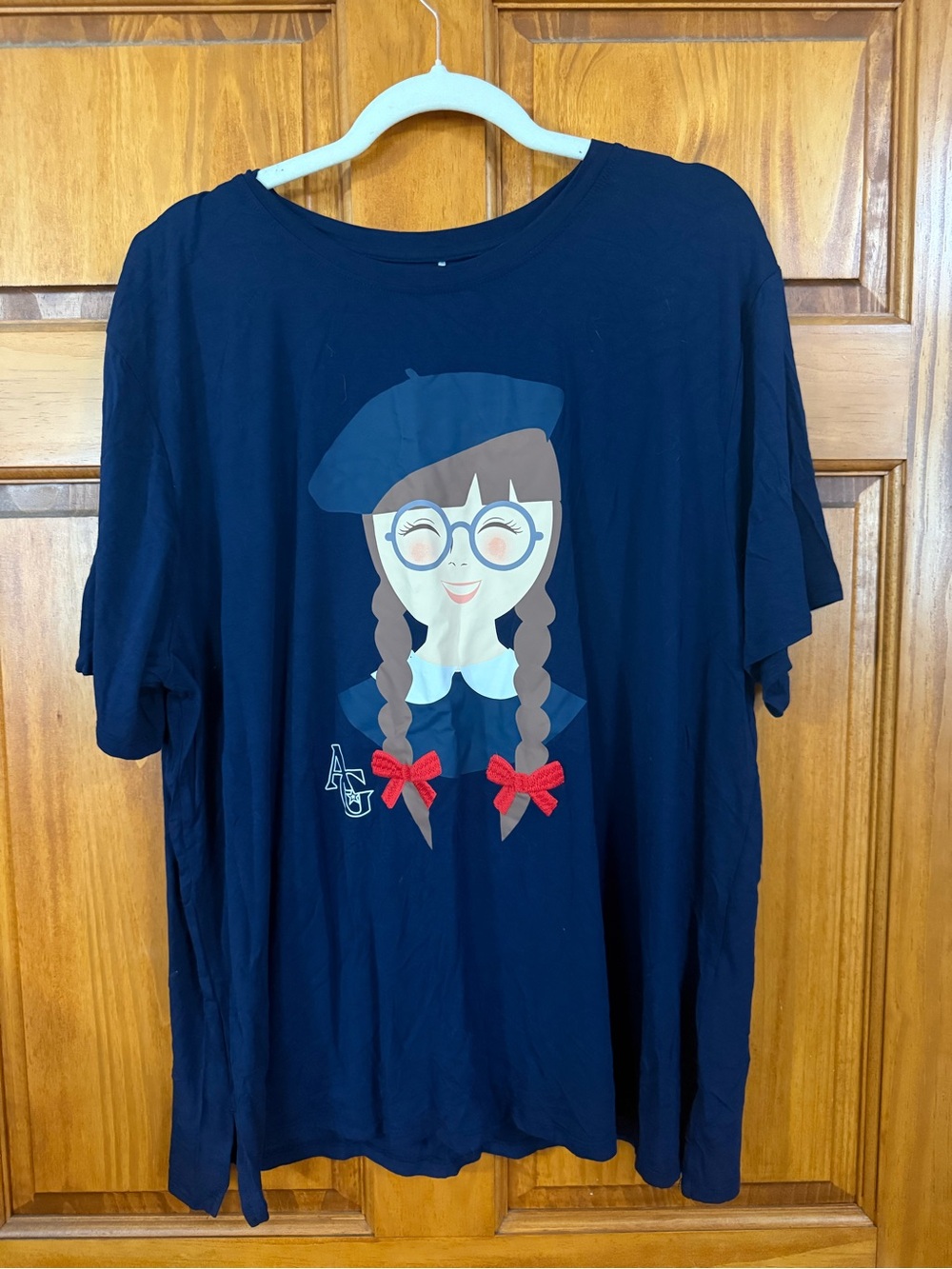 Posh Peanut Navy Tee with Smiling Girl Graphic and Red Bows